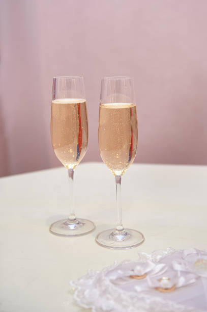 istock Two glasses of champagne on the table for the wedding ceremony 652682008