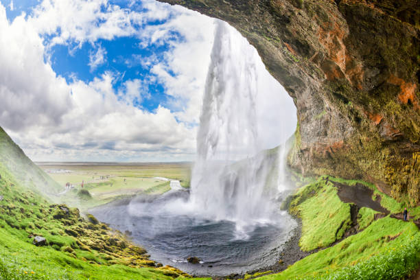 istock Tourists discover the Seljalandsfoss waterfall 652682376