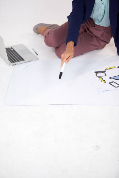 istock Businesswoman preparing a chart with icons 652686348