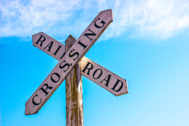 istock Old Railroad Crossing Sign Against Blue Sky 652696048