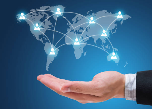 istock Businessman hand holding people social network isolated on blue background 652697732