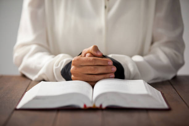 istock Woman with a bible 652697774