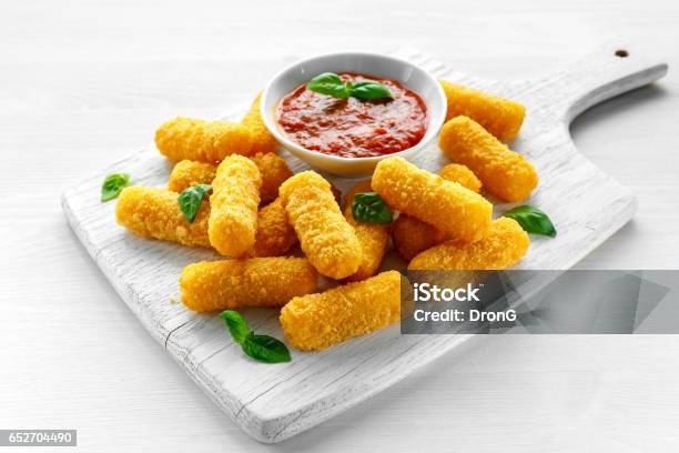 Breaded Mozzarella Cheese Sticks With Tomato Basil Sauce Stock Photo - Download Image Now