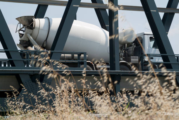 istock Cement mixer in transit on the metal bridge 652705106