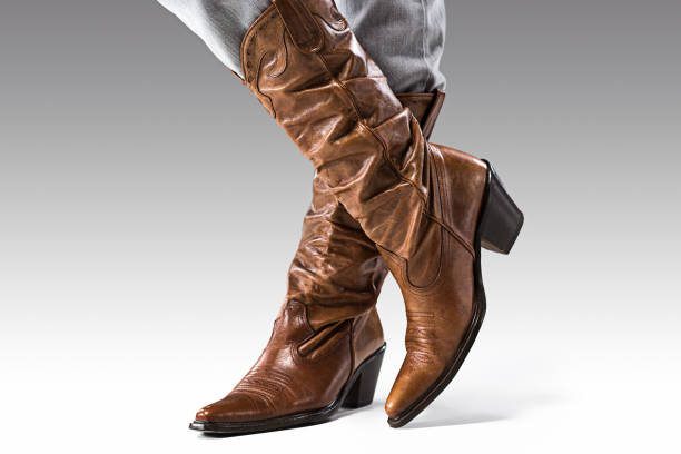 Legs In Jeans And Cowboys Boots Stock Photo - Download Image Now - Boot,  Cowgirl, Cowboy Boot - iStock