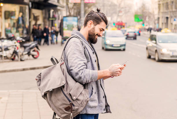istock Photo of Man texting on phone 652708548