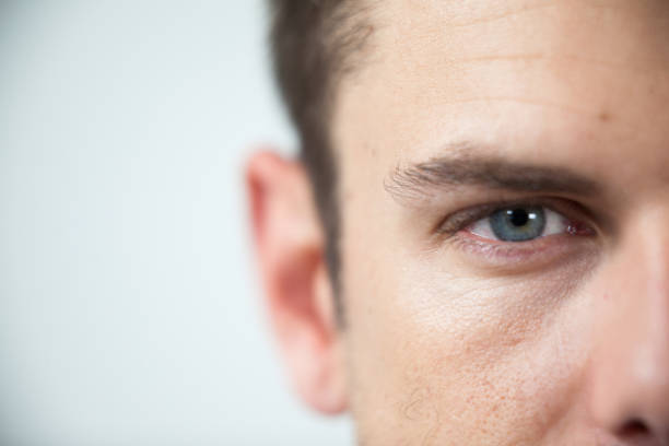 istock Man wearing contact lens 652708786