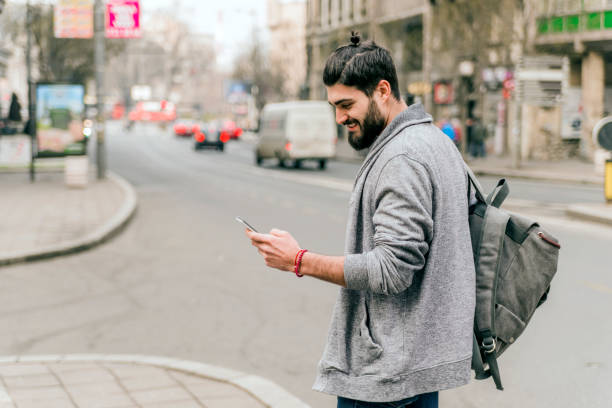 istock Young casual businessman using smartphone 652709076