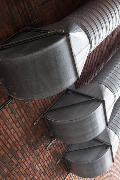 istock Outdoor ventilation tubes on brick wall 652709158