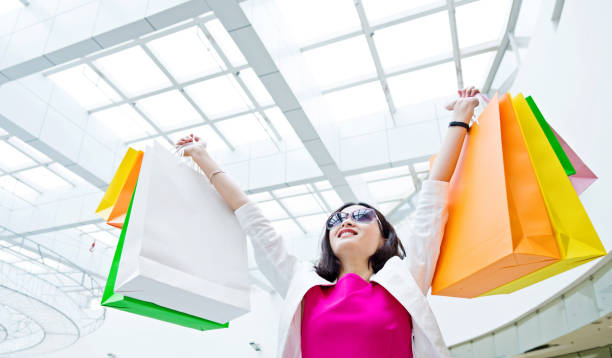 istock Happy female shopper 652717036