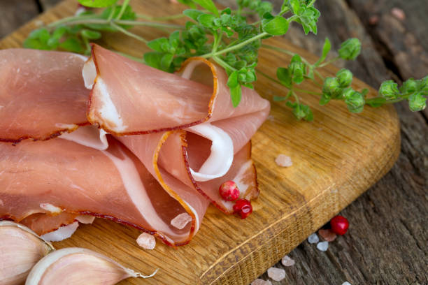 istock prosciutto on wooden board 652725838