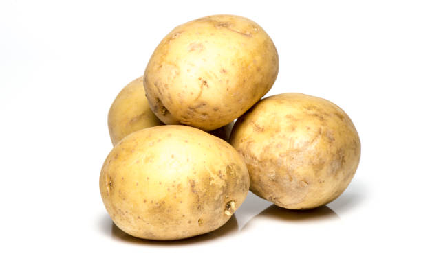 istock Cluster of brown potatoes on white background 652726780