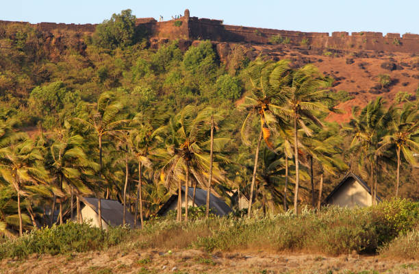 View of Chapora Fort and Vagator beach, Goa, India View of Chapora Fort and Vagator beach, Goa, India chapora fort stock pictures, royalty-free photos & images