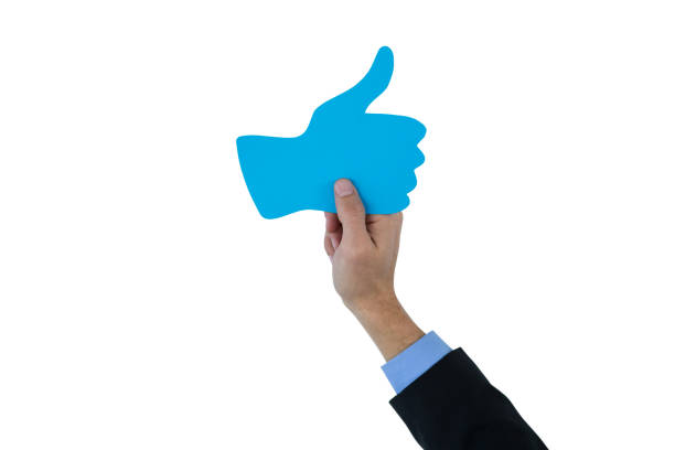 istock Businessman holding thumbs up sign 652744272