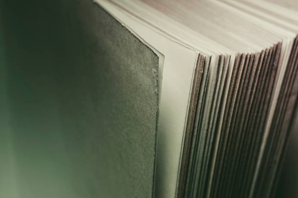 istock View of old book pages. Education and wisdom concept. 652746600