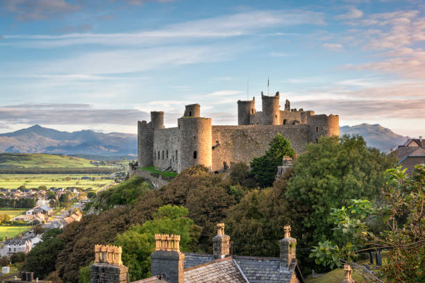 Harlech Castle at sunrise Harlech, Wales, United Kingdom - September 20, 2016: View of Harlech Castle in North Wales at sunrise snowdonia stock pictures, royalty-free photos & images