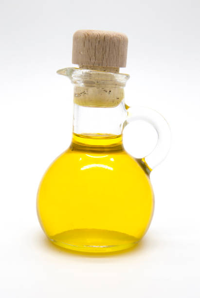 istock Small olive oil bottle with cork 652754332