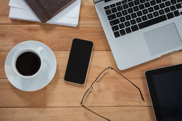 istock Laptop, digital tablet, mobile phone and organizer on desk 652757410