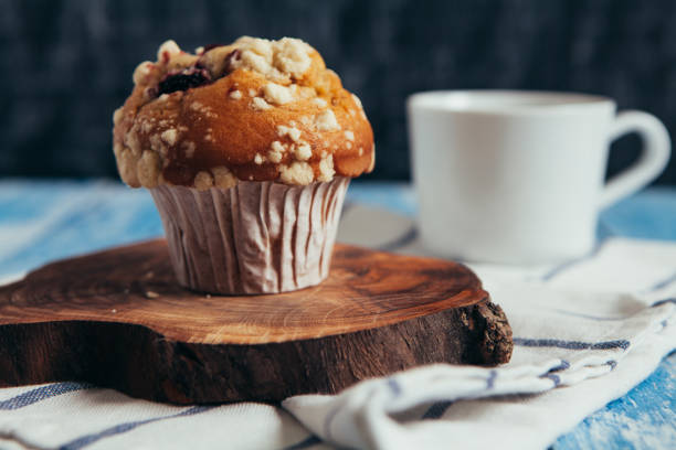 istock Muffin with berry on wooden table 652779192