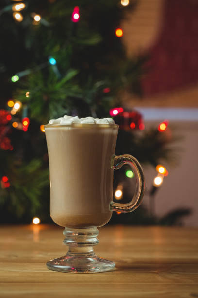 istock Cup of coffee with marshmallow on wooden table 652779238