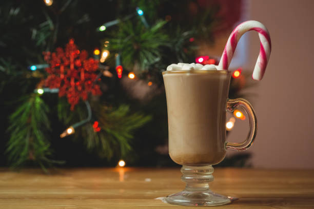 istock Cup of coffee with marshmallow and candy cane 652779244