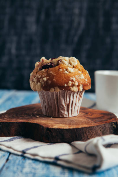 istock Muffin with berry on wooden table 652779370