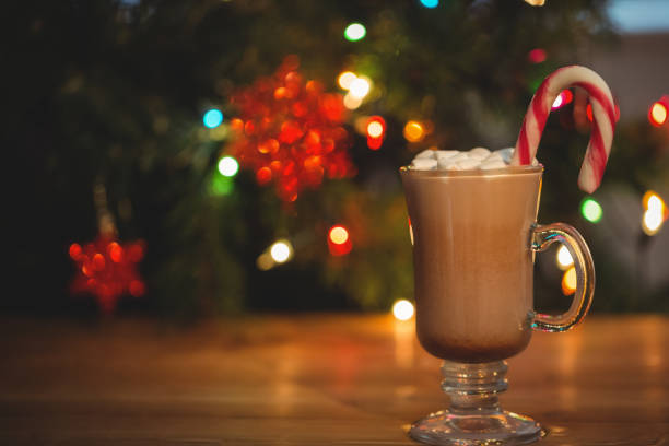 istock Cup of coffee with marshmallow and candy cane 652785414