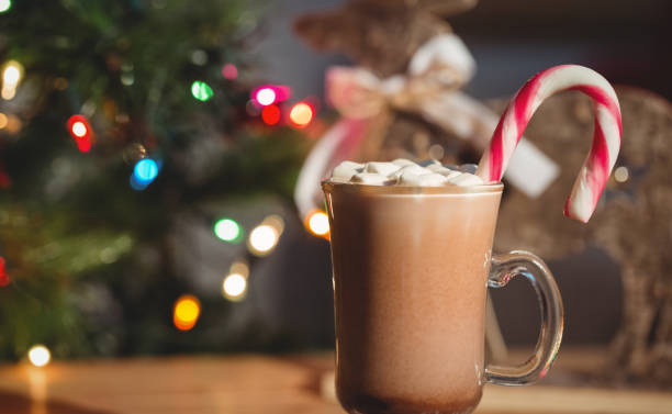 istock Cup of coffee with marshmallow and candy cane 652785488