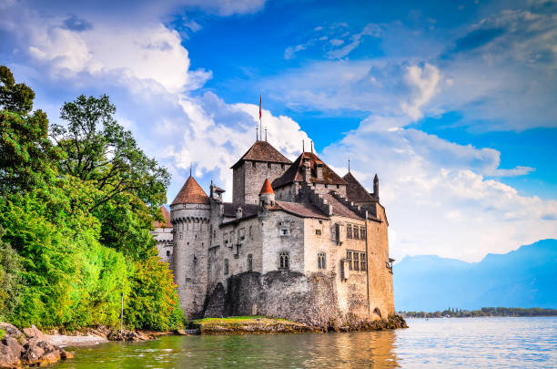 Chillon Castle - Switzerland, Lake Geneve CHILLON CASTLE - SWITZERLAND - 18 AUGUST 2011. Chillon Castle, Switzerland. Montreaux, Lake Geneve, one of the most visited castle in Swiss, attracts more than 300,000 visitors every year. chateau de chillon photos stock pictures, royalty-free photos & images