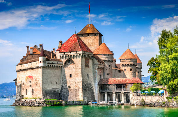 Chillon Castle - Switzerland, Lake Geneve CHILLON CASTLE - SWITZERLAND - 18 AUGUST 2011. Chillon Castle, Switzerland. Montreaux, Lake Geneve, one of the most visited castle in Swiss, attracts more than 300,000 visitors every year. montreux photos stock pictures, royalty-free photos & images