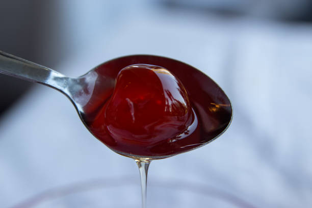 Cherry in the ice cream. Cherry dessert.