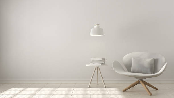 Scandinavian minimalistic background, white armchair with table and pendant lamp on herringbone natural parquet flooring, interior design