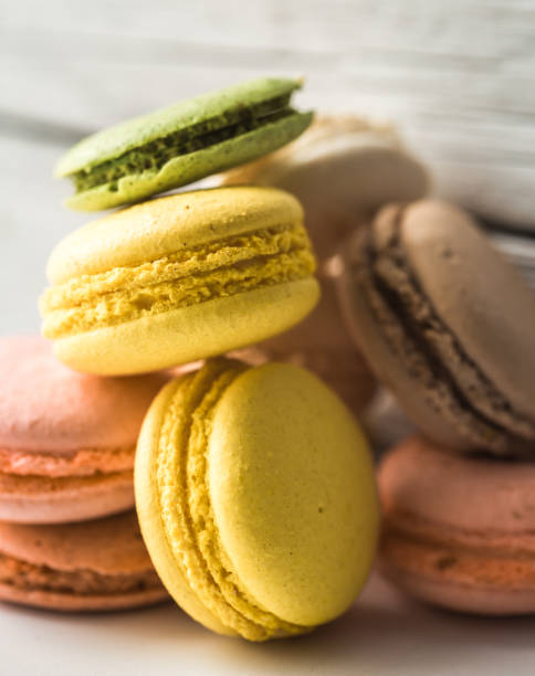 istock Colorful macaroons on wooden background 652793058