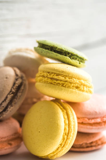 istock Colorful macaroons on wooden background 652793142
