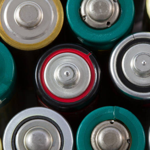 istock Close-up top view of alkaline AA batteries. 652795430