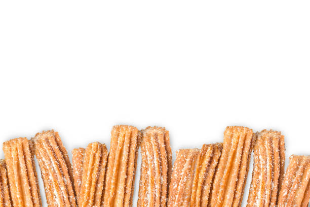 churros arranged in row isolated on white background - bakery bread breakfast close up imagens e fotografias de stock