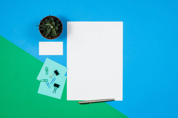 istock Mock-up blank page or magazine on colorful background top view 652799126
