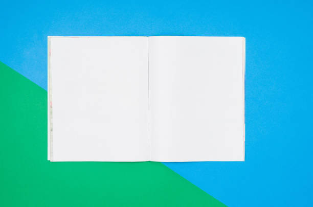 istock Mock-up blank page or magazine on colorful background top view 652799158