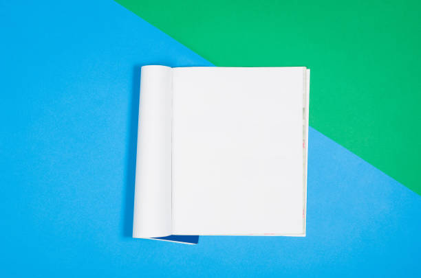 istock Mock-up blank page or magazine on colorful background top view 652799190