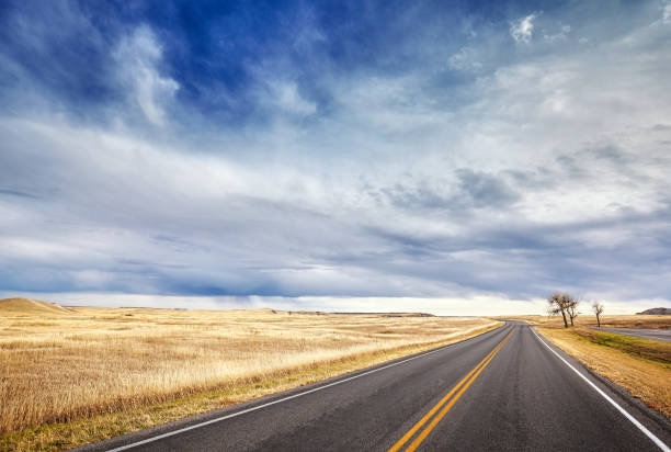istock Autumn country highway landscape. 652799276