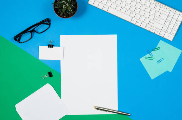istock Mock-up blank page or magazine on colorful background top view 652799300