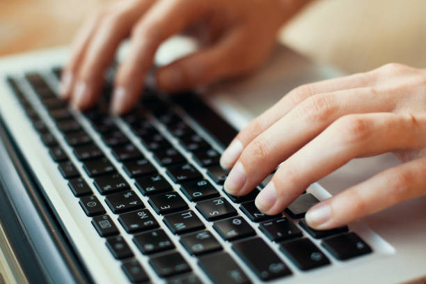 istock Woman hands typing on laptop. 652799478
