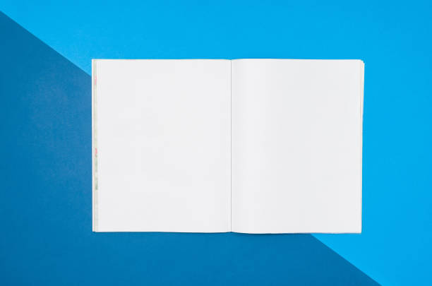 istock Mock-up blank page or magazine on colorful background top view 652799690