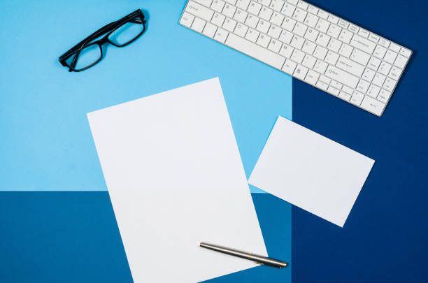 istock Mock-up blank page or magazine on colorful background top view 652802376