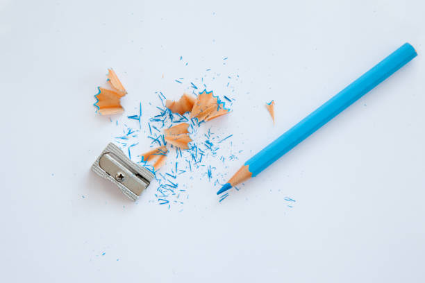 blue wooden pencil and sharpener stock photo