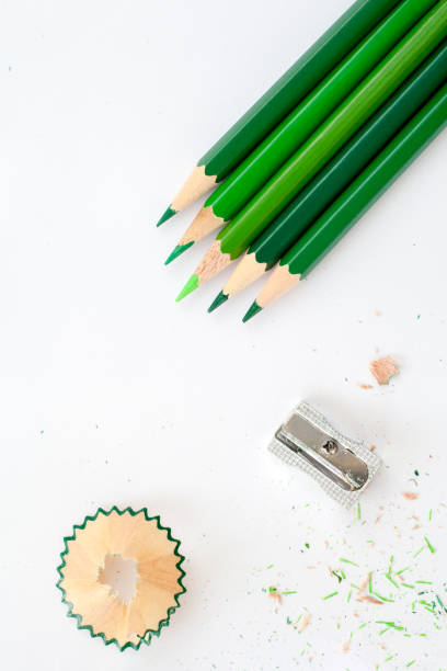 five green wooden pencils stock photo