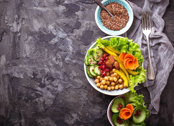 istock Vegetable salad with carrot, cucumber, pepper, almond and chick-pea 652806106