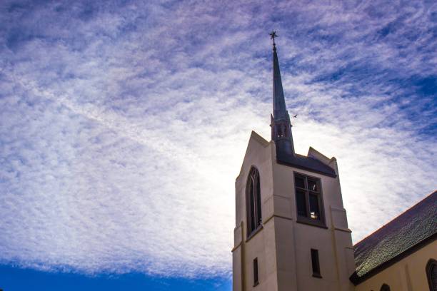 istock Church Steeple With Sun In Background 652812204