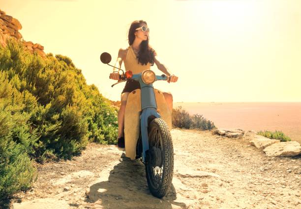 istock Pretty woman in a scooter 652822036