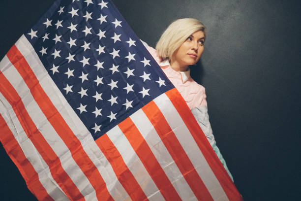 istock Blonde girl with USA flag 652832520